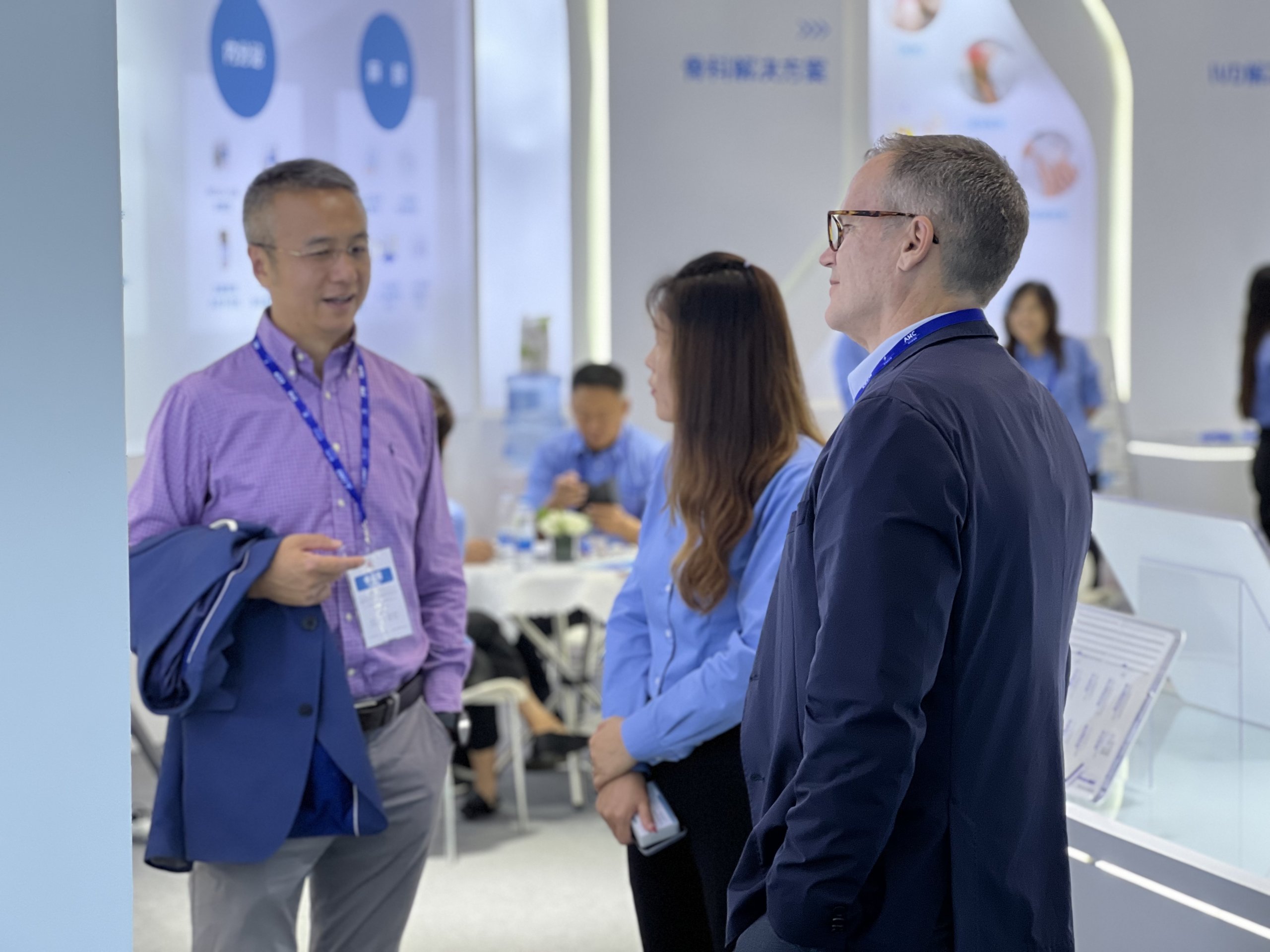WEGO Medical employees talk to customers at the CMEF exhibition