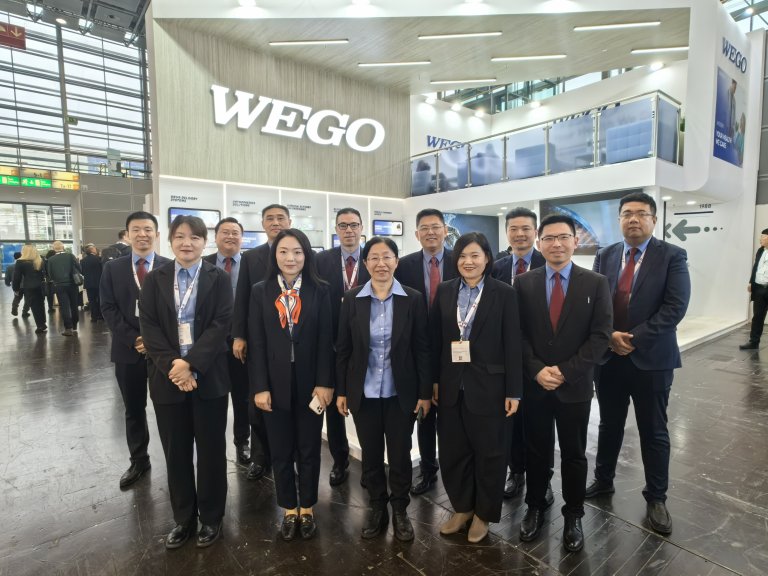 Group photo of WEGO Medical attendees at the exhibition